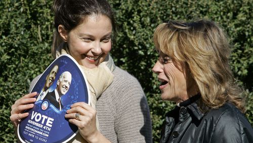 FILE - Actress Ashley Judd, left, talks with Valerie Biden Owens, sister of Democratic vice presidential candidate, Sen. Joe Biden, D-Del., during a Women For Obama event in Chapel Hill, N.C., Oct. 30, 2008. Judd is adding her voice to calls for President Joe Biden to step aside from the presidential race following his performance in last month's debate. Judd wrote in an opinion piece for USA Today on Friday, July 12, 2024 that she worries the Democrat could lose to Republican Donald Trump in November. Judd did not suggest a replacement for Biden. (AP Photo/Gerry Broome, File)