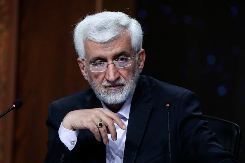 In this photo released by the Iranian state-run TV, IRIB, presidential candidate for June 28 election, Saeed Jalili, former Iran's top nuclear negotiator, attends a debate of the candidates at the TV studio in Tehran, Iran, Thursday, June 20, 2024. (Morteza Fakhri Nezhad/IRIB via AP)