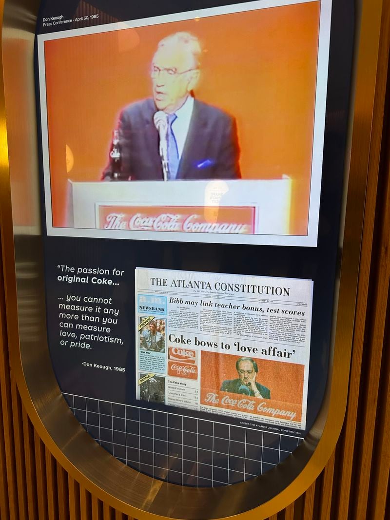 A video at the Beverage Lab at the World of Coca-Cola Museum shows The Atlanta Journal-Constitution story about Coca-Cola bringing back the original Coke formula in 1985 after backlash about New Coke. RODNEY HO/rho@ajc.com