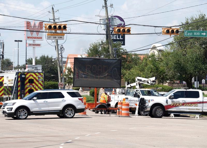 Traffic is diverted away from Spencer Highway west of East Boulevard near the site of pipeline exposition, Wednesday, Sept. 18, 2024, in La Porte, Texas. (Jason Fochtman/Houston Chronicle via AP)