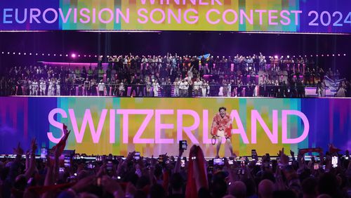 FILE -Nemo of Switzerland, who performed the song The Code, celebrates after winning the Grand Final of the Eurovision Song Contest in Malmo, Sweden, May 11, 2024. (AP Photo/Martin Meissner, File)