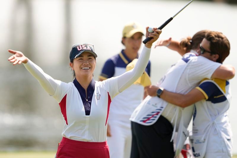 United States' Rose Zhang reacts after defeating Europe's Carlota Ciganda during a Solheim Cup golf tournament singles match at the Robert Trent Jones Golf Club, Sunday, Sept. 15, 2024, in Gainesville, Va. (AP Photo/Matt York)