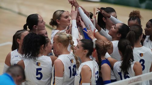 San Jose State players gather in a huddle before facing Colorado State in the first set of an NCAA college volleyball match Thursday, Oct. 3, 2024, in Fort Collins, Colo. (AP Photo/David Zalubowski)