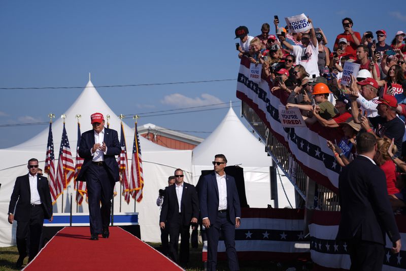 FILE - Republican presidential candidate former President Donald Trump arrives for a campaign rally, July 13, 2024, in Butler, Pa. (AP Photo/Evan Vucci, File)