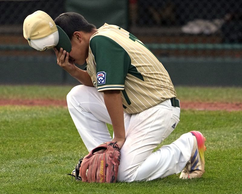 Taiwan's Yu Teng-Hao reacts to losing the Little League World Series Championship game to Lake Mary, Fla., in South Williamsport, Pa., Sunday, Aug. 25, 2024. (AP Photo/Gene J. Puskar)