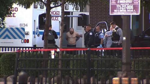 Joshua Zimmerman, who escaped from a Mississippi courthouse and is wanted on murder and armed robbery charges, is taken into custody following a standoff with police at a restaurant in Chicago on Wednesday, Aug. 21, 2024. (ABC 7 Chicago via AP)