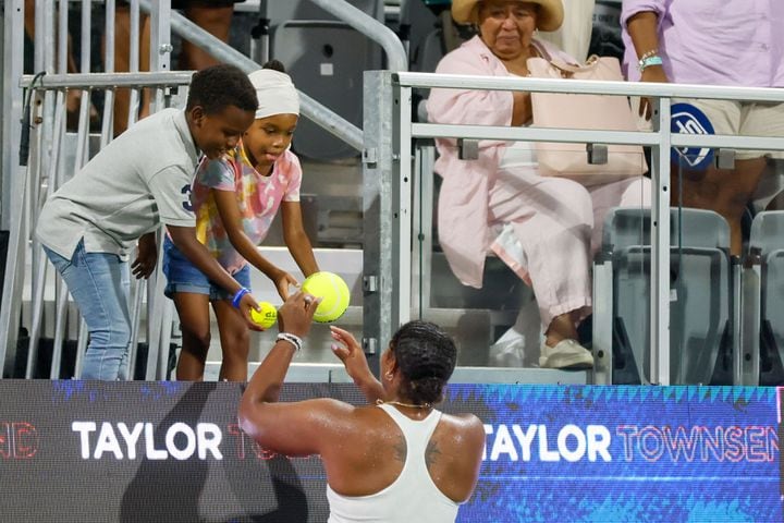 After the match, Taylor Townsend signed autographs for fans following her 7-6, 6-3 victory over Sloane Stephens in an exhibition match at the Atlanta Open in Atlantic Station on Sunday, July 21, 2024.
(Miguel Martinez / AJC)