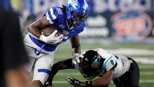 Georgia State Panthers tight end Ahmon Green (85) runs after a catch against Coastal Carolina Chanticleers cornerback Jacob Proche (23) during the second half at Center Parc Stadium, Thursday, September 22, 2022, in Atlanta. Coastal Carolina won 41-24. (Jason Getz / Jason.Getz@ajc.com)