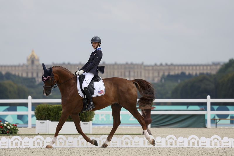 Fiona Howard of the U.S. competes in the individual Freestyle Event - Grade II at the Château de Versailles at the 2024 Paralympics, Saturday, Sept. 7, 2024. (AP Photo/Kileigh Kane)