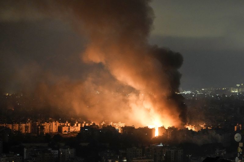 Flames and smoke rise from an Israeli airstrike in Dahiyeh, Beirut, Lebanon, Sunday, Oct. 6, 2024. (AP Photo/Bilal Hussein)