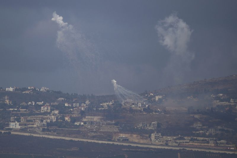 Israeli shelling hits an area in southern Lebanon as seen from northern Israel, Tuesday, Oct. 1, 2024. (AP Photo/Leo Correa)