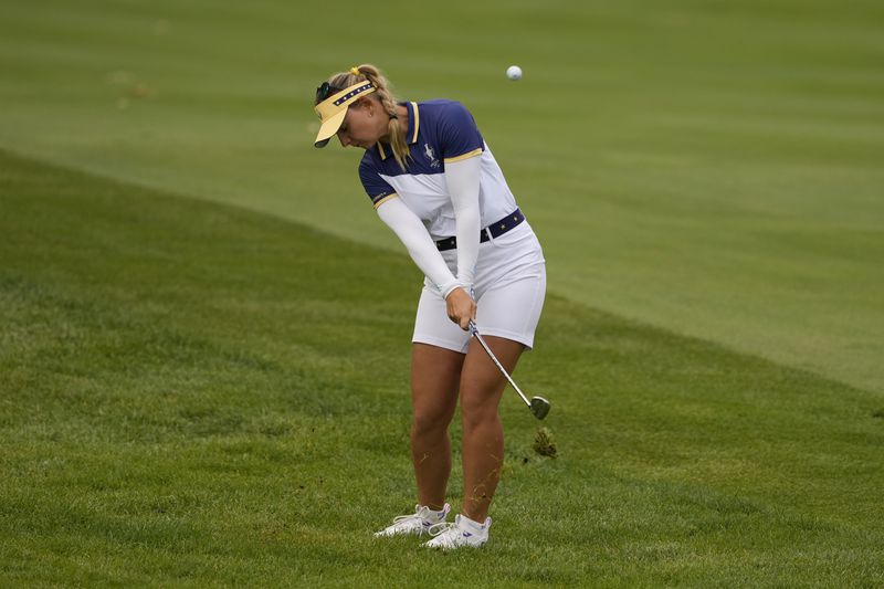 Europe's Emily Pedersen hits from the fifth fairway during a Solheim Cup golf tournament singles match at the Robert Trent Jones Golf Club, Sunday, Sept. 15, 2024, in Gainesville, Va. (AP Photo/Matt York)