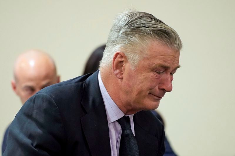 Actor Alec Baldwin reacts during his trial for involuntary manslaughter for the 2021 fatal shooting of cinematographer Halyna Hutchins during filming of the Western movie "Rust," Friday, July 12, 2024, at Santa Fe County District Court in Santa Fe, N.M. The judge threw out the case against Baldwin in the middle of his trial and said it cannot be filed again. (Ramsay de Give/Pool Photo via AP)