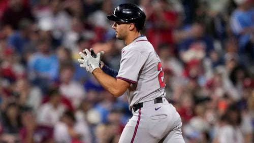 Atlanta Braves' Matt Olson reacts after hitting a home run against Philadelphia Phillies pitcher Cristopher Sánchez during the sixth inning of a baseball game, Thursday, Aug. 29, 2024, in Philadelphia. (AP Photo/Matt Slocum)