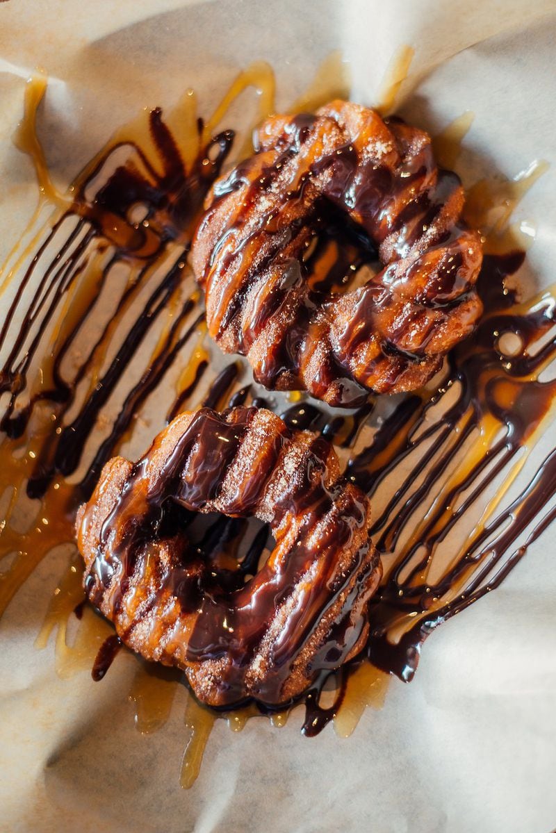 Among the offerings from the Springs Cinema & Taphouse are Churro Donuts. CONTRIBUTED BY JARROD CECIL PHOTOGRAPHY