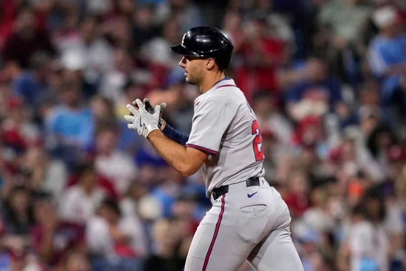 Atlanta Braves' Matt Olson reacts after hitting a home run against Philadelphia Phillies pitcher Cristopher Sánchez during the sixth inning of a baseball game, Thursday, Aug. 29, 2024, in Philadelphia. (AP Photo/Matt Slocum)