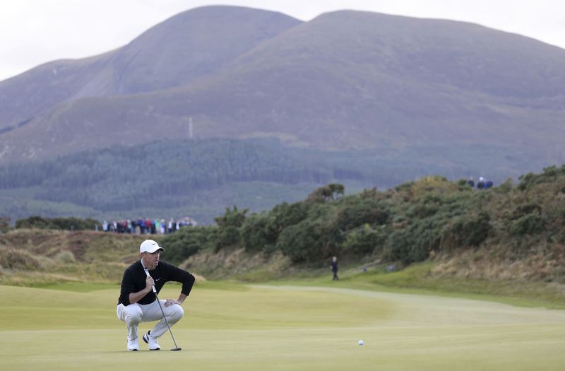 Northern Ireland's Rory McIlroy lines up a putt on the thirteenth green during day four of the Amgen Irish Open 2024 at Royal County Down in Newcastle, County Down, England, Sunday Sept. 15, 2024. (Peter Morrison/PA via AP)