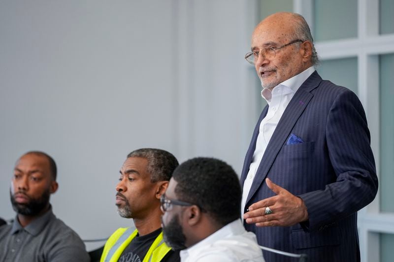 Attorney William Murphy, right, speaks during a press conference announcing a class action claim against the owners of the Dali seeking damages for economic losses suffered by Longshoreman Union members, with union members Ryan Hale, Anthony Wynn and Alonzo Key, Thursday, Sept. 26, 2024, in Baltimore. (AP Photo/Stephanie Scarbrough)