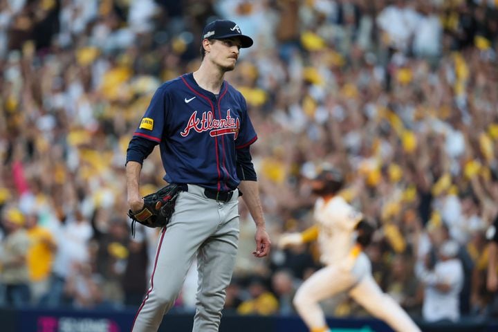 Atlanta Braves pitcher Max Fried reacts after a home run by San Diego Padres catcher Kyle Higashioka, rear, during the second inning of National League Division Series Wild Card Game Two at Petco Park in San Diego on Wednesday, Oct. 2, 2024.   (Jason Getz / Jason.Getz@ajc.com)