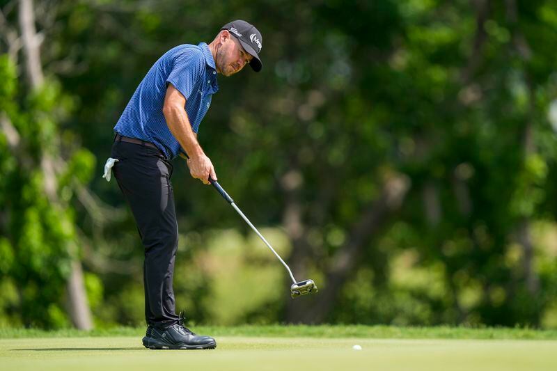 Brian Harman putts on the fifth green during the first round of the Charles Schwab Challenge golf tournament at Colonial Country Club, Thursday, May 23, 2024, in Fort Worth, Texas. (AP Photo/LM Otero)