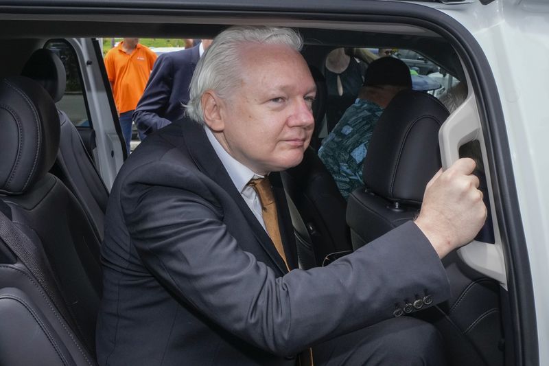 FILE - WikiLeaks founder Julian Assange leaves federal court in Saipan, Mariana Islands, June 26, 2024. (AP Photo/Eugene Hoshiko, File)