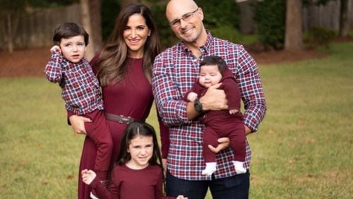 Dr. Enrique Lopez, in this photo at right, with his family. Lopez works in the intensive care unit at Phoebe Putney Memorial Hospital in Albany, Georgia. The hospital is in the midst of the outbreak of COVID-19, the disease caused by the novel coronavirus. Lopez runs one of the intensive care units, trying to keep uninfected patients safe from the virus. (PHOTO courtesy of Dr. Enrique Lopez)