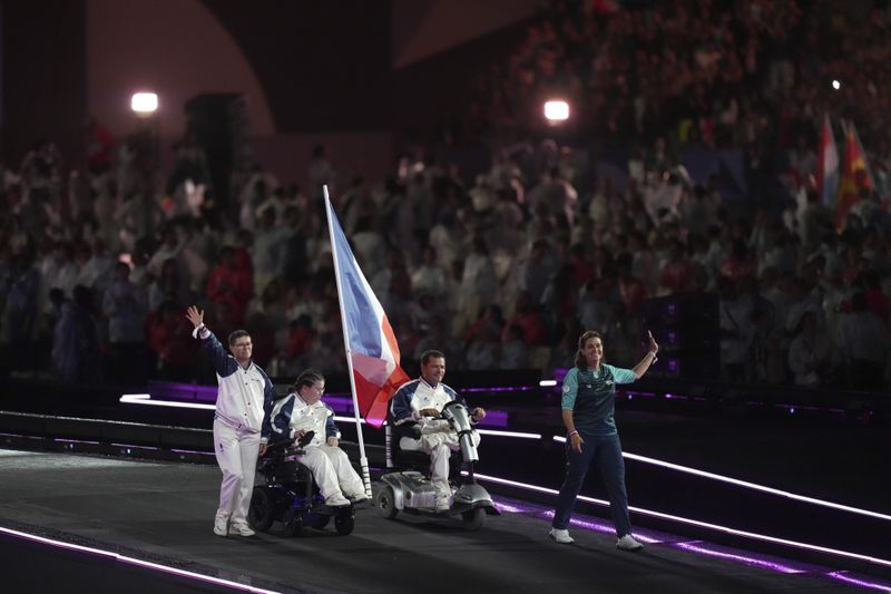 Members of the French delegation parade during the closing ceremony of the 2024 Paralympics, Sunday, Sept. 8, 2024, in Paris, France. (AP Photo/Thibault Camus)