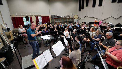 Conductor David Elliott leads the Savannah Wind Symphony during a rehearsal for the upcoming "Let Freedom Ring" Patriotic Concert at Georgia Southern University Armstrong Campus.