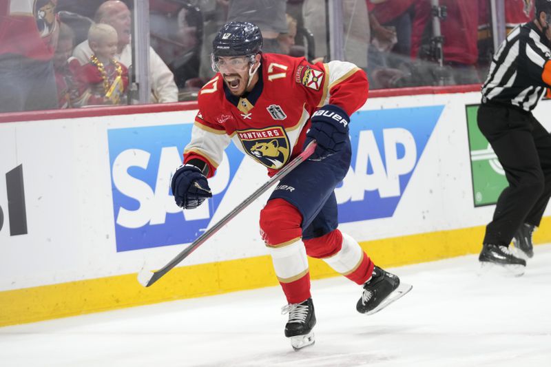 Florida Panthers center Evan Rodrigues (17) reacts after scoring a goal during the second period of Game 5 of the NHL hockey Stanley Cup Finals against the Edmonton Oilers, Tuesday, June 18, 2024, in Sunrise, Fla. (AP Photo/Wilfredo Lee)