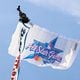 A parachute flies approaching Truist Park during the unveiling celebrations of the 2025 All-Star Game logo on Monday, July 22, 2024, in Atlanta.

(Miguel Martinez/ AJC)