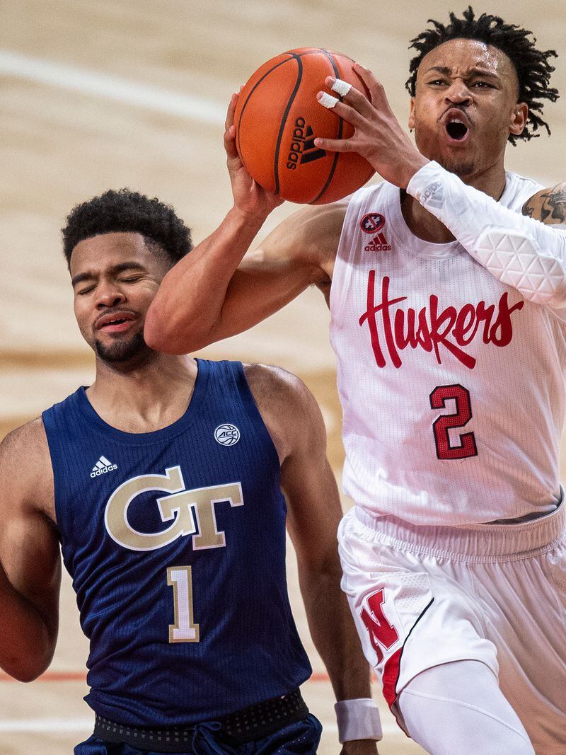 Nebraska guard Trey McGowens (2) is fouled by Georgia Tech's Kyle Sturdivant (1) en route to the basket during the second half Wednesday, Dec. 9, 2020, in Lincoln, Neb. (Francis Gardler/Lincoln Journal Star)