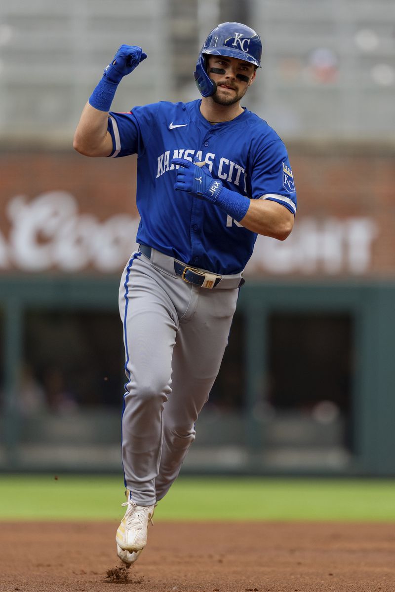 Kansas City Royals' Michael Massey rounds second base after hitting a two-run home run in the first inning of a baseball game against the Atlanta Braves, Sunday, Sept. 29, 2024, in Atlanta. (AP Photo/Jason Allen)