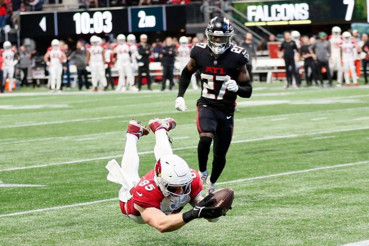 Cardinals tight end Trey McBride (85) dives for a touchdown during the second quarter against the Atlanta Falcons during the second quarter on Sunday, January 1, 2023, in Atlanta.
 Miguel Martinez / miguel.martinezjimenez@ajc.com