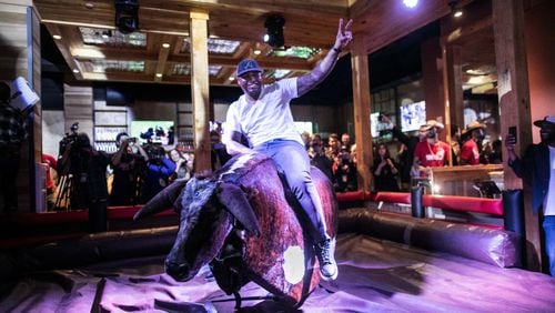 Andruw Jones rides the mechanical bull, "Druw," at PBR Atlanta. Photo credit: Jeff Roffman Photography