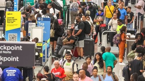 Passengers fill the domestic terminal at Hartsfield-Jackson International Airport on Tuesday, July 23, 2024, on the fifth day of a massive global technology outage that has severely impacted the operations of Delta Air Lines. John Spink/jspink@ajc.com