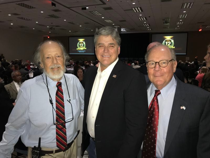Sean Hannity (center) flew down to the Georgia Radio Hall of Fame gala in 2018 to introduce his former WGST boss Eric Seidel, who was inducted that year. John Long (left) runs the hall of fame.