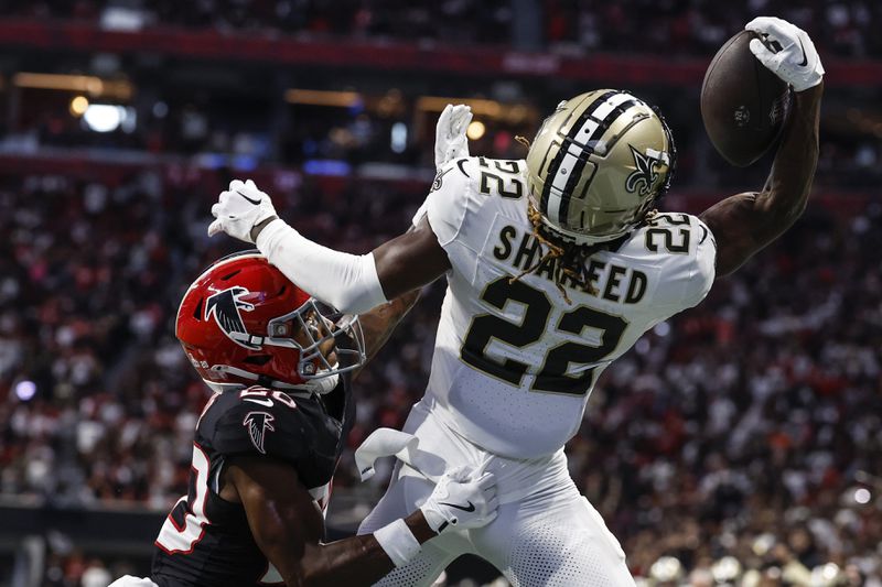 Atlanta Falcons cornerback Dee Alford (20) breaks up a pass intended for New Orleans Saints wide receiver Rashid Shaheed (22) during the second half of an NFL football game, Sunday, Sept. 29, 2024, in Atlanta. (AP Photo/Butch Dill)