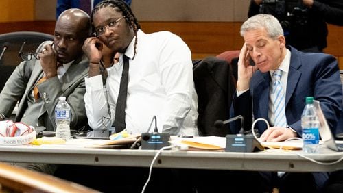 Atlanta rapper Young Thug listens in on a bench meeting between the judge and another attorney before the opening statements in his Fulton County gang and racketeering trial on Monday, Nov. 27, 2023.   (Steve Schaefer/steve.schaefer@ajc.com)