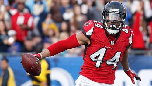 Vic Beasley Jr. heads toward the end zone with a fumble recovery TD in Sunday’s 42-14 victory over the Rams. (Josh Lefkowitz/Getty Images)