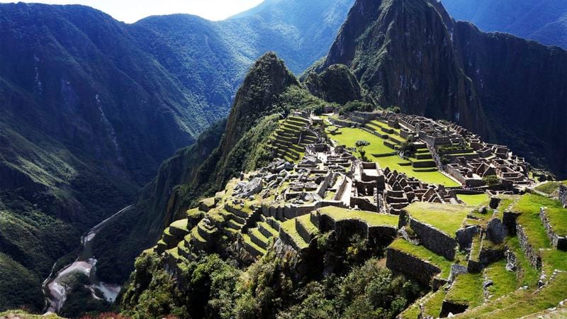 This 2021 aerial photo shows Machu Picchu in Peru. The popular travel destination is included in a new guide book for LGBTQ+ travelers, “Out in the World,” by the couple behind The Nomadic Boys travel blog, Stefan Arestis and Sebastien Chaneac. (Brand g Vacations via AP)