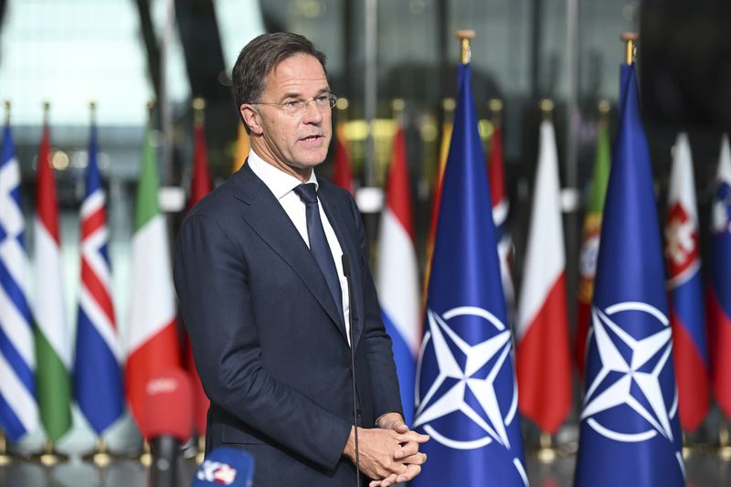 The new NATO Secretary General Mark Rutte makes statements during a handover ceremony at NATO headquarters in Brussels, Belgium, Tuesday, Oct. 1, 2024. (AP Photo/Harry Nakos)