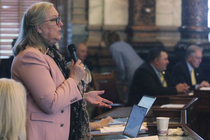 Kansas state Sen. Molly Baumgardner, R-Louisburg, asks questions during the Senate debate about the details of a proposal aimed at luring the Kansas City Chiefs from Missouri, Tuesday, June 18, 2024, at the Statehouse in Topeka, Kansas. The proposal would authorize state bonds to help the Super Bowl champion Chiefs and Major League Baseball's Kansas City Royals finance new stadiums in Kansas. (AP Photo/John Hanna)