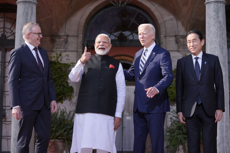 President Joe Biden greets from left, Australia's Prime Minister Anthony Albanese, India's Prime Minister Narendra Modi and Japan's Prime Minister Fumio Kishida, at the Quad leaders summit at Archmere Academy in Claymont, Del., Saturday, Sept. 21, 2024. (AP Photo/Mark Schiefelbein)