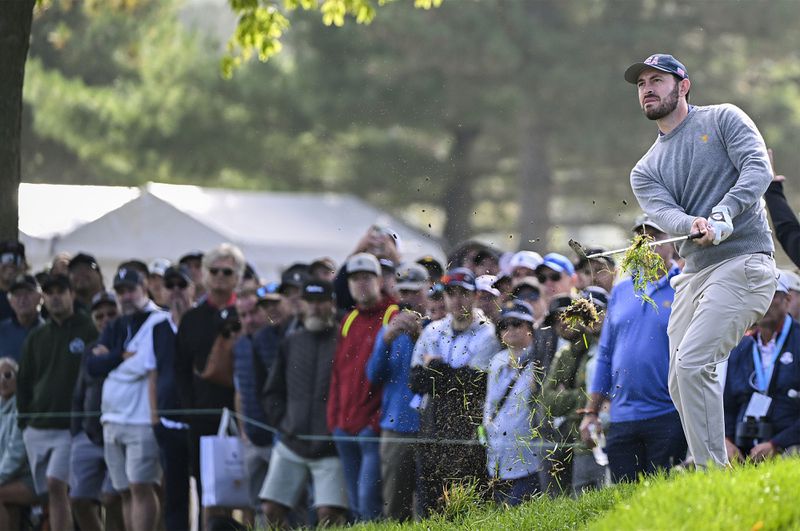 United States team member Patrick Cantlay plays a shot on the sixth hole during the third round at the Presidents Cup golf tournament at Royal Montreal Golf Club in Montreal Saturday, Sept. 28, 2024. (Graham Hughes/The Canadian Press via AP)