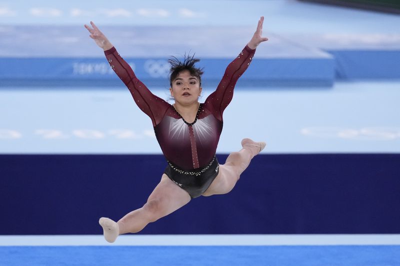 FILE - Alexa Moreno, of Mexico, performs her floor exercise routine during the women's artistic gymnastic qualifications at the 2020 Summer Olympics, Sunday, July 25, 2021, in Tokyo. (AP Photo/Ashley Landis, File)