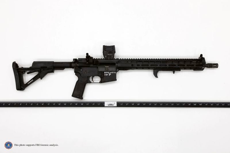 This image provided by the FBI shows Thomas Matthew Crooks' rifle as recovered at the scene in Butler, Pa., July 13, 2024. Crooks searched online for events of both former President Donald Trump and President Joe Biden and saw the Pennsylvania campaign rally where he opened fire as a "target of opportunity," a senior FBI official said. (FBI via AP)