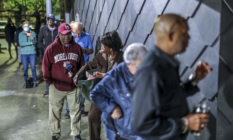 October 17, 2022 Atlanta: Several dozen voters were there in the first hour of early voting at the Buckhead Library located at 269 Buckhead Avenue NE in Atlanta on Monday, Oct. 17, 2022.  (John Spink / John.Spink@ajc.com) 

