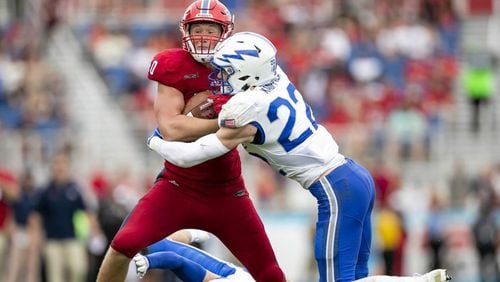 Florida Atlantic Owls tight end Harrison Bryant (40) is hit by Air Force Falcons defensive back Garrett Kauppila (22) near the goal line Sept. 8, 2018, at FAU Stadium in Boca Raton, Fla.