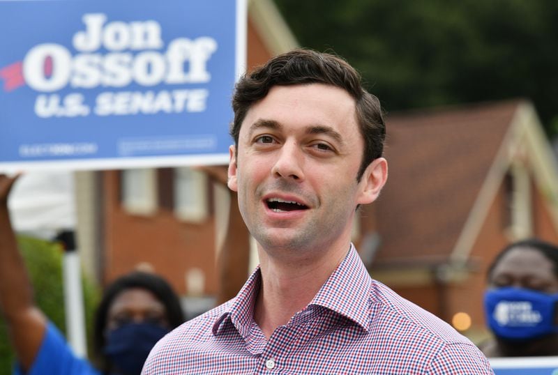 Democratic U.S. Senate candidate Jon Ossoff speaks to supporters at a socially distanced event. He's focused his campaign on the treatment given to special interests. “Does the government serve the people," he said, "or does it serve those who can buy access?” Hyosub Shin / Hyosub.Shin@ajc.com)