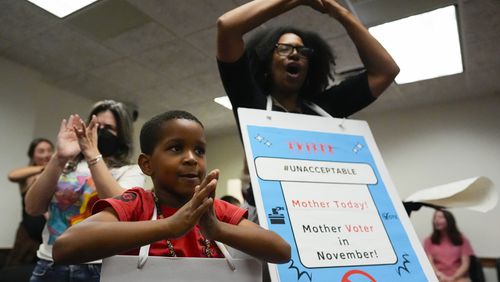 Parents and children speak in a meeting at the state Capitol, where children spoke to legislators about gun violence, Thursday, Sept. 19, 2024, in Atlanta. (AP Photo/Mike Stewart)